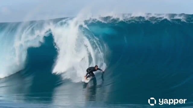 Surfer Riding Massive Ocean Barrel