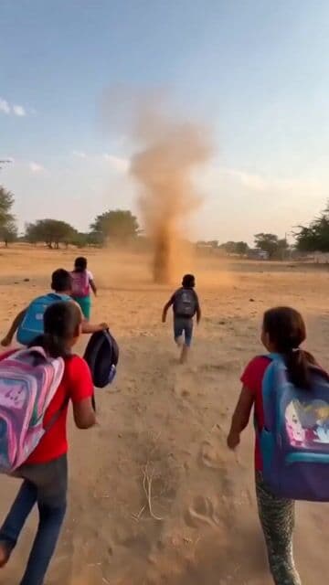 Kids Play in Dust Devil